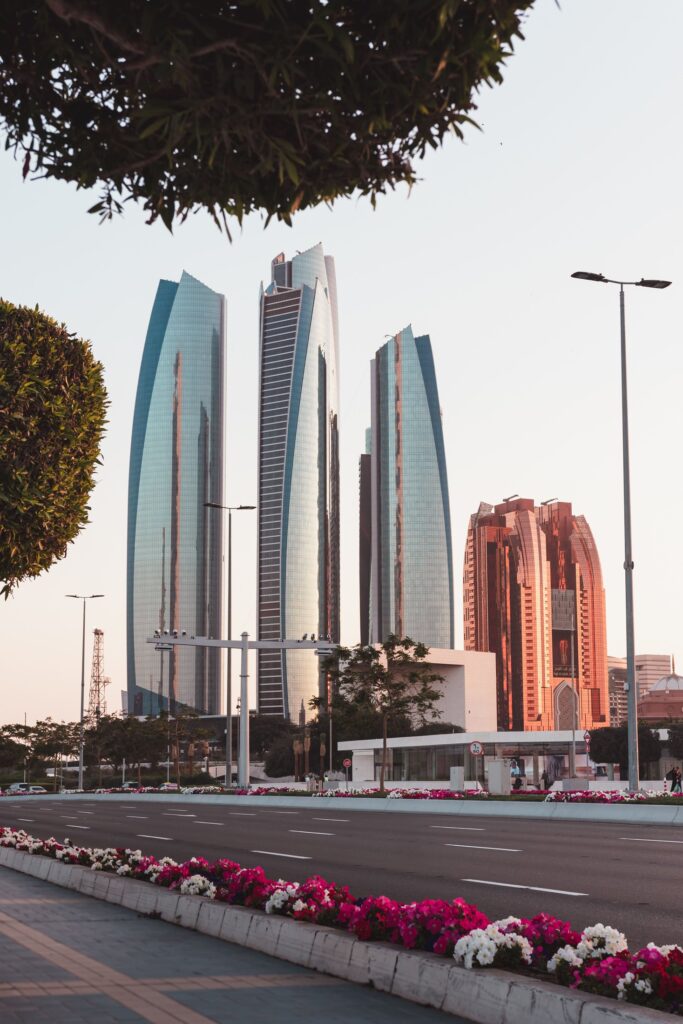 Abu Dhabi business district and modern towers, representing technology investment and capital formation.