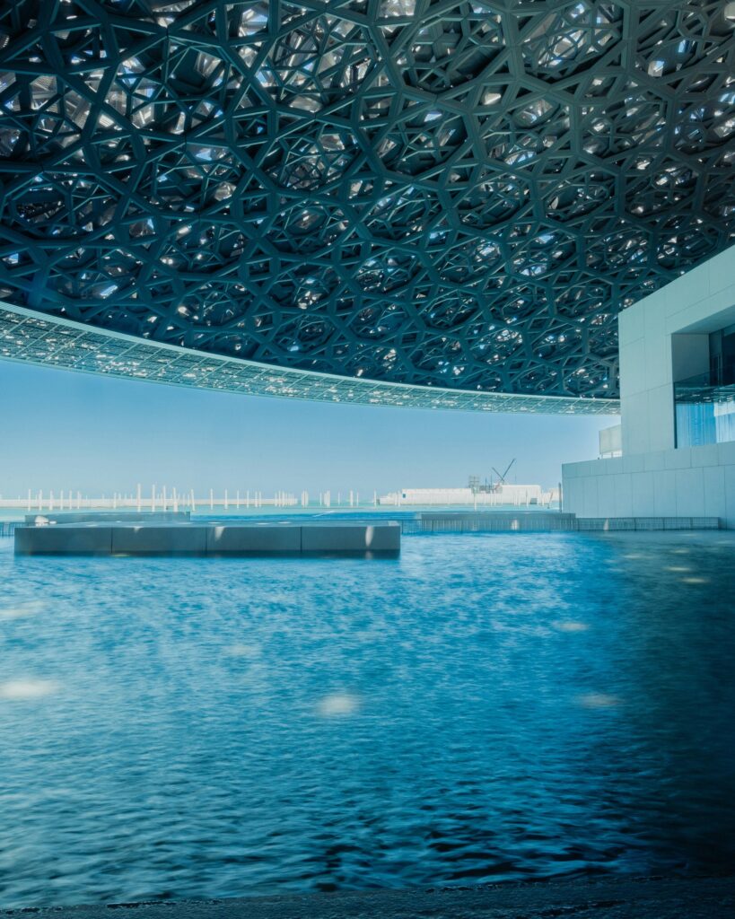 Contemporary institutional architecture at Louvre Abu Dhabi, representing governance and institutional systems.